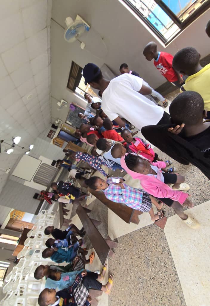 Children and leaders gathered for an activity inside the church at 5 Day Club